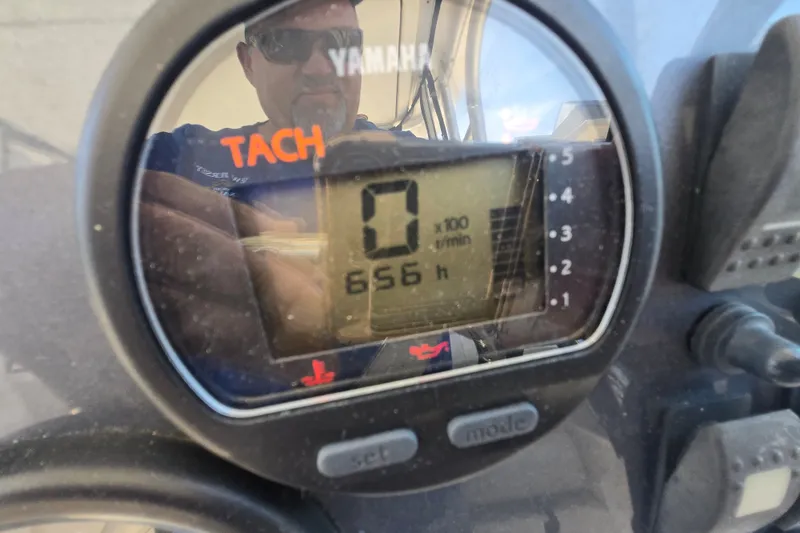 Slide: The Image of Close-up of Yamaha tachometer on 2006 Robalo R265 Walkaround, displaying 656 hours. - 14