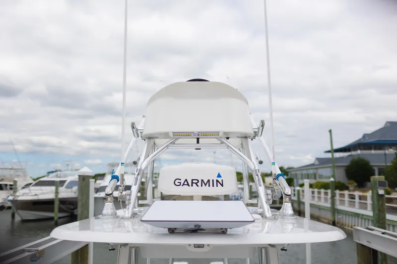 Slide: The Image of 2021 Onslow Bay 27 Offshore Edition with Garmin radar at marina. - 12