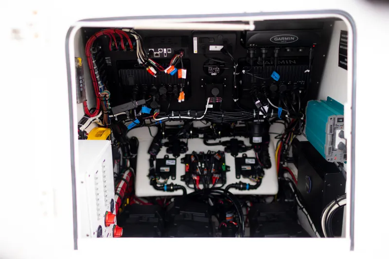 Slide: The Image of Electrical system of a 2021 Onslow Bay 27 Offshore Edition boat, featuring advanced wiring and components. - 24