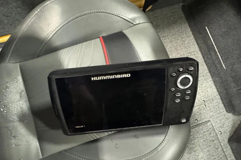 Slide: The Image of Humminbird Helix 7 fish finder on 2023 Tracker Targa V-18 WT boat seat. - 13