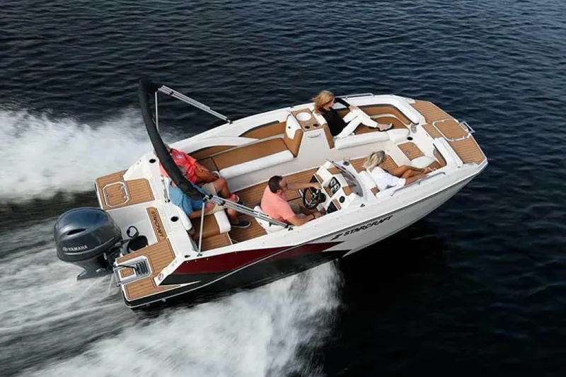 Slide: The Image of Manufacturer Provided Image: 2023 Starcraft SVX 191 OB boat cruising with passengers on a lake. - 2