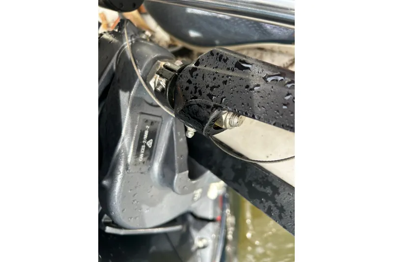 Slide: The Image of Close-up of 2023 Starcraft SVX 191 OB boat component with water droplets. - 21