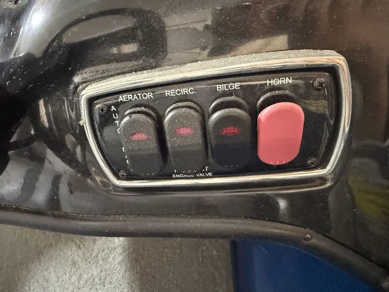 Slide: The Image of Close-up of a control panel with switches for aerator, recirculation, bilge, and horn. - 9