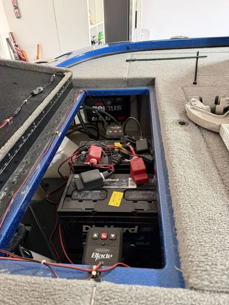 Slide: The Image of An open battery compartment in a 2018 Nitro Z18 boat shows batteries and wiring. - 14