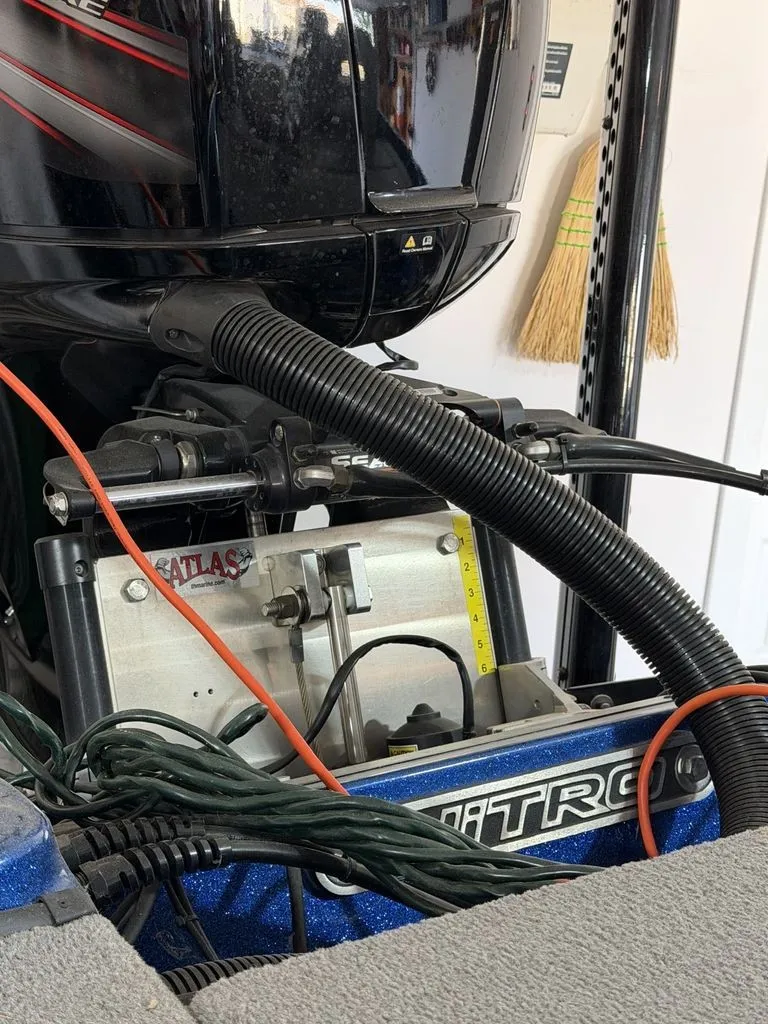 Slide: The Image of Close-up of a 2018 Nitro Z18 boat engine in a garage setting. - 24