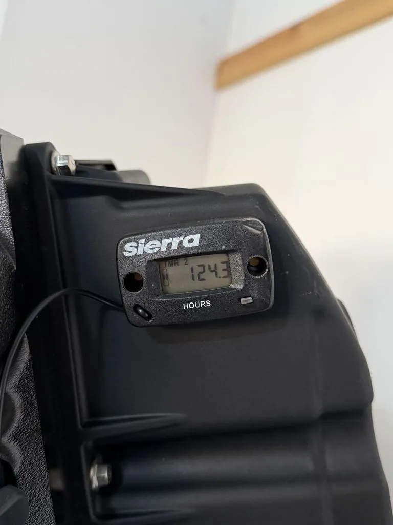 Slide: The Image of A Sierra hour meter displays 124.3 hours, mounted on a black background. - 25