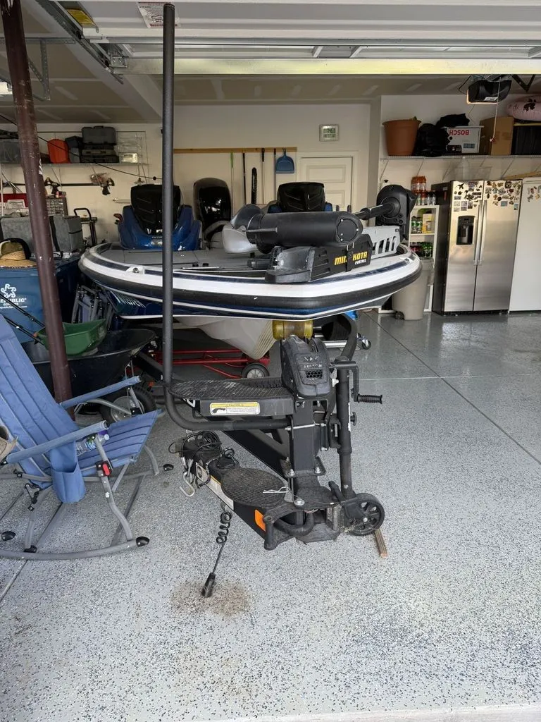 Slide: The Image of A 2018 Nitro Z18 boat is parked in a garage. It is mounted on a trailer. - 21