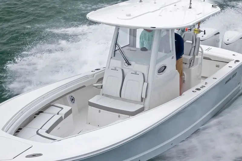 The Image of 2027 Regulator 28 Forward Seating boat cruising on water, showcasing sleek design and spacious layout. - 0