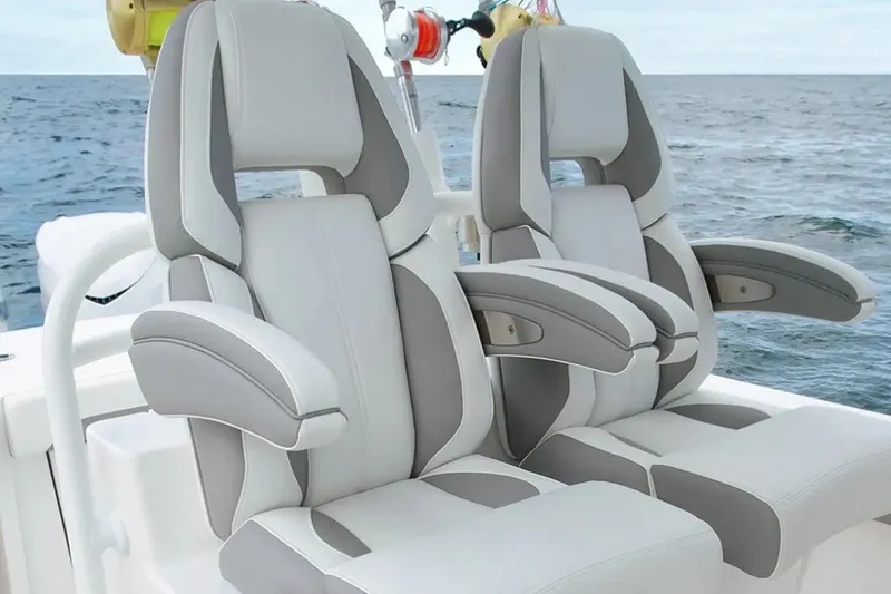 Slide: The Image of 2027 Regulator 28 Forward Seating boat with luxurious dual seats on the ocean. - 4