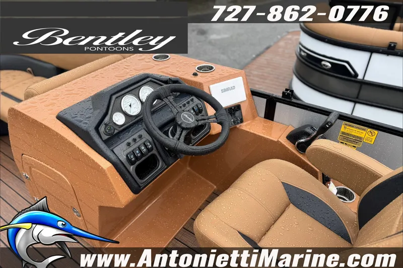 Slide: The Image of 2027 Bentley Pontoons Legacy 223 Swingback dashboard with steering wheel and controls, featuring raindrops. - 4