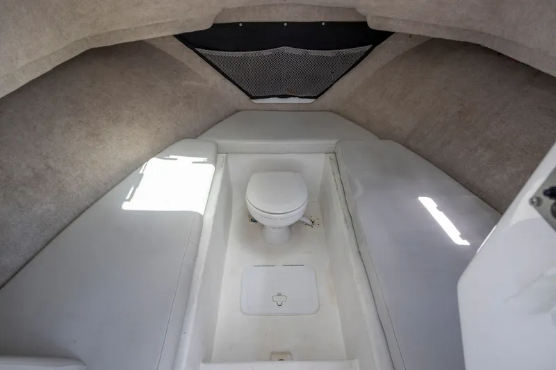 Slide: The Image of Interior cabin of 2022 Parker 2600 Center Console boat with toilet. - 13