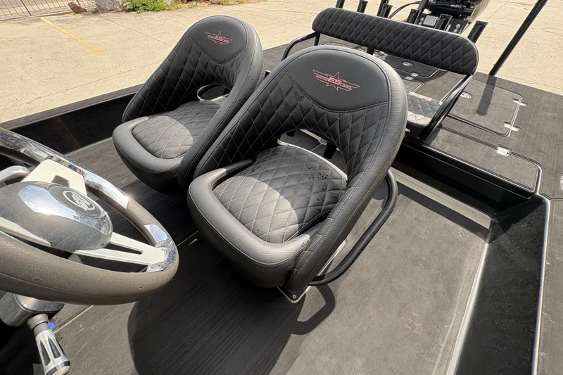 Slide: The Image of Luxurious black leather seats in a 2016 SCB 247 boat interior. - 18