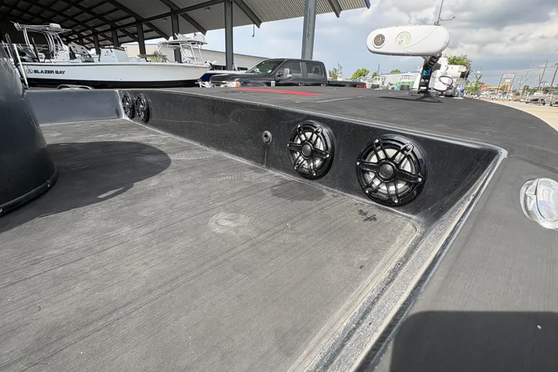 Slide: The Image of 2016 SCB 247 boat deck with speakers and equipment under a canopy. - 12