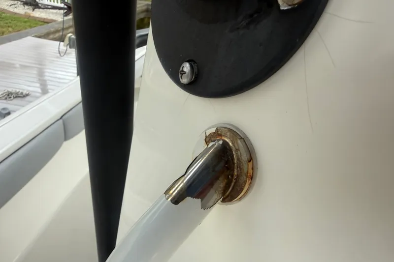 Slide: The Image of Close-up of a 2021 Skeeter SX2550 Fish boat's damaged metal fitting. - 36