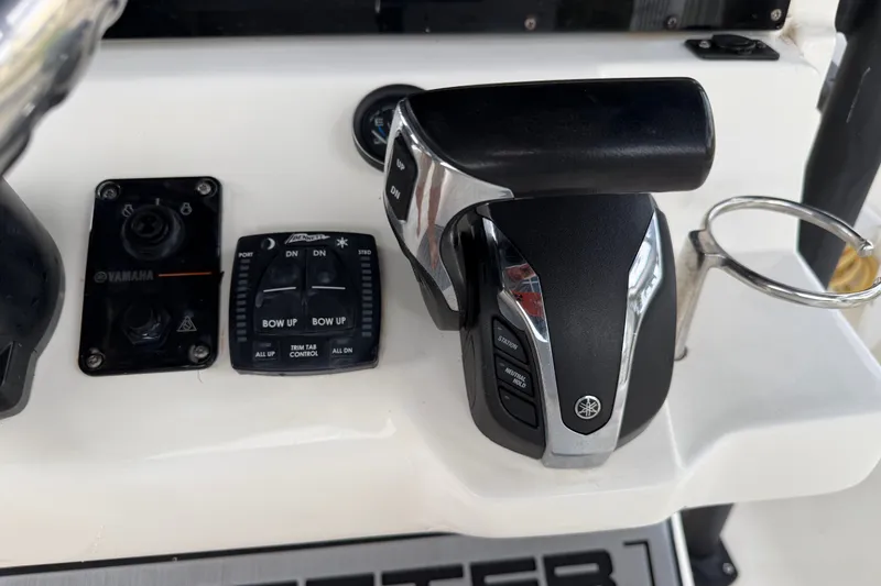 Slide: The Image of 2021 Skeeter SX2550 Fish boat controls with Yamaha throttle and trim tab panel. - 26