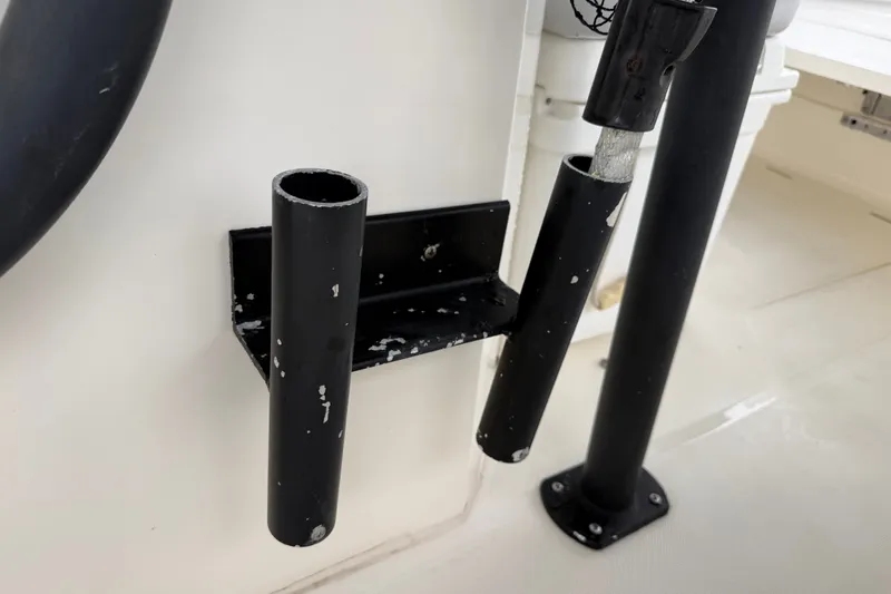 Slide: The Image of Rod holders on a 2021 Skeeter SX2550 Fish boat, showcasing fishing equipment setup. - 33