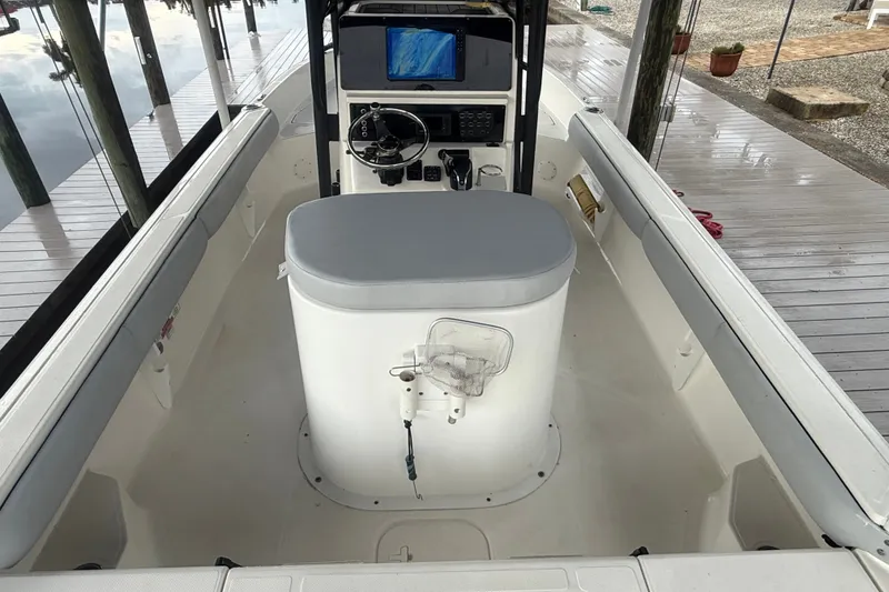 Slide: The Image of 2021 Skeeter SX2550 Fish boat interior with steering console and seating. - 18