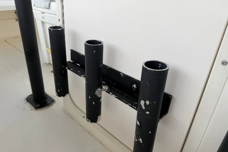 Slide: The Image of Rod holders on a 2021 Skeeter SX2550 Fish boat, showing wear and use. - 28