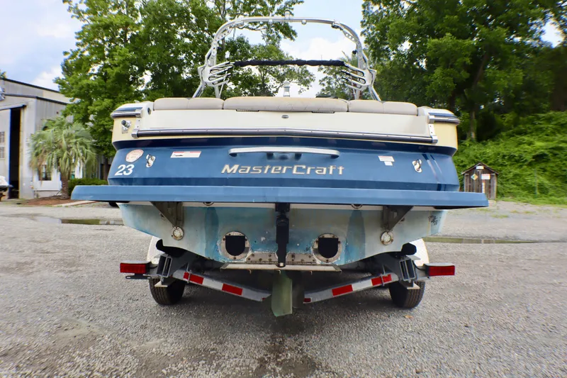 Slide: The Image of Rear view of a 2010 MasterCraft X-35 SS boat on a trailer. - 6