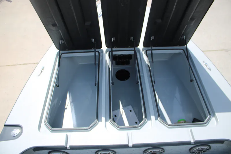 Slide: The Image of Open storage compartments on a 2025 Mamba 24VX boat, showcasing ample space and design. - 12