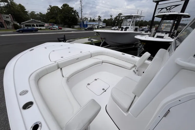 Slide: The Image of 2027 Tidewater 2500 Carolina Bay boat with spacious seating and sleek design. - 13