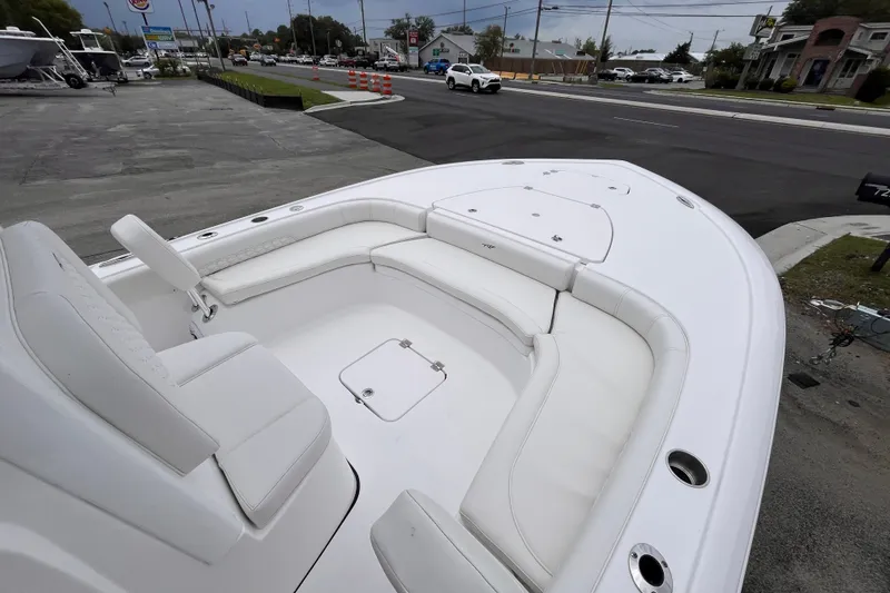 Slide: The Image of 2027 Tidewater 2500 Carolina Bay boat with spacious seating and sleek design. - 11