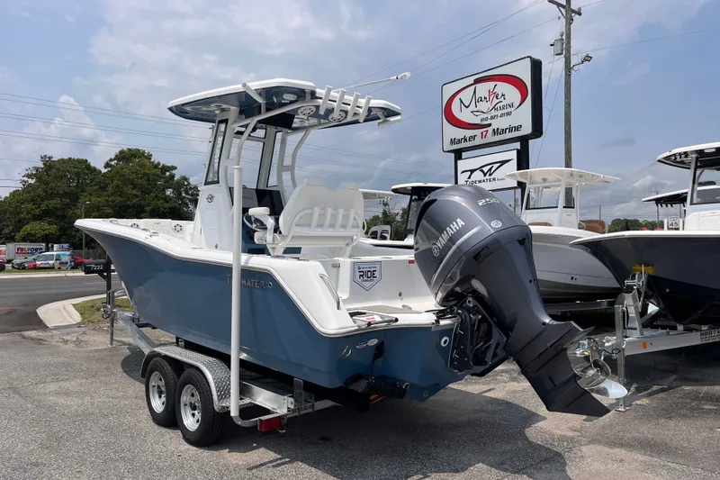 Slide: The Image of 2027 Tidewater 232 CC Adventure boat with Yamaha engine at Marker 17 Marine dealership. - 2
