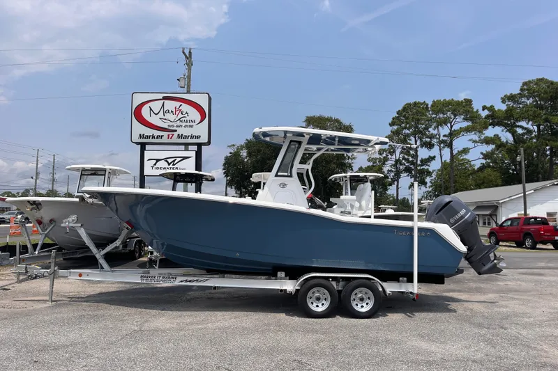 The Image of 2027 Tidewater 232 CC Adventure boat on trailer at Marker 17 Marine dealership. - 0
