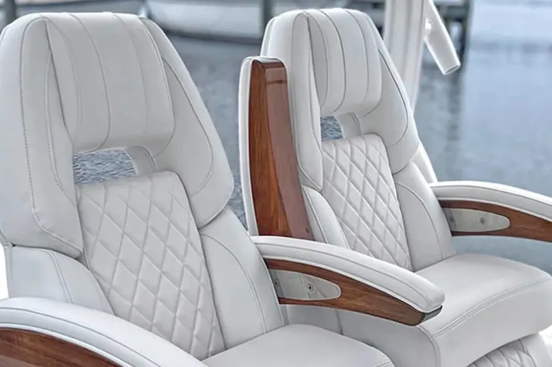 Slide: The Image of Luxurious white leather seats with wood accents on a 2027 Regulator 30XO boat. - 5