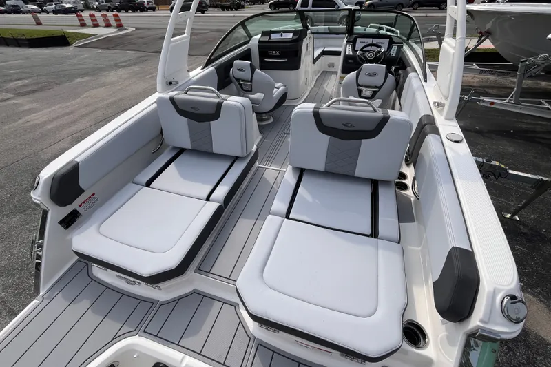 Slide: The Image of The image shows the cockpit of a 2025 Chaparral 250 OSX with luxurious seating and modern design. - 7