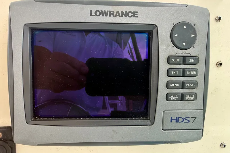 Slide: The Image of Lowrance HDS7 fishfinder on 1993 Grady-White Dolphin 250 boat dashboard. - 13