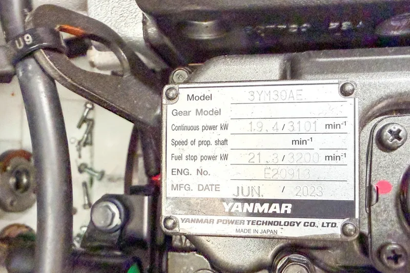 Slide: The Image of Yanmar engine label on a 2024 Beneteau Oceanis 34.1 sailboat, model 3YM30AE. - 30