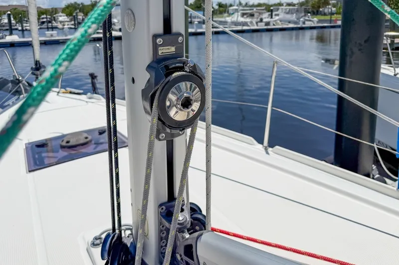 Slide: The Image of Close-up of rigging on a 2024 Beneteau Oceanis 34.1 sailboat at a marina. - 49