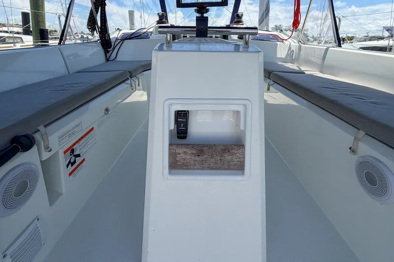 Slide: The Image of 2024 Beneteau Oceanis 34.1 cockpit with seating and control panel, showcasing modern design. - 42