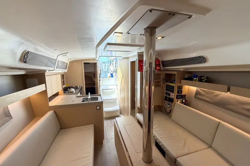 Slide: The Image of Interior of 2024 Beneteau Oceanis 34.1 yacht, featuring modern design and comfortable seating. - 27