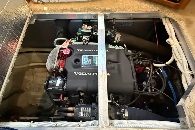 Slide: The Image of Engine compartment of a 2002 Carver 404 Cockpit Motor Yacht with Volvo Penta engine. - 66