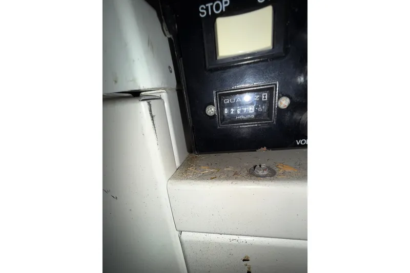 Slide: The Image of Close-up of hour meter on 2002 Carver 404 Cockpit Motor Yacht dashboard. - 71