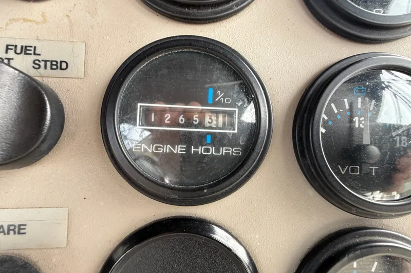 Slide: The Image of Instrument panel of 2002 Carver 404 Cockpit Motor Yacht showing 1265.3 engine hours. - 30