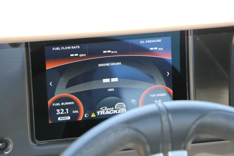 Slide: The Image of Dashboard display of 2025 Sun Tracker SportFish 20 DLX showing fuel and engine metrics. - 24