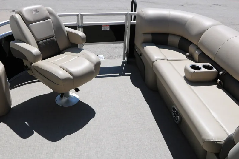 Slide: The Image of 2025 Sun Tracker SportFish 20 DLX interior with plush seating and cup holders. - 35