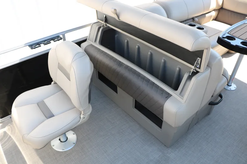 Slide: The Image of 2025 Sun Tracker SportFish 20 DLX boat interior with seating and storage compartments. - 20