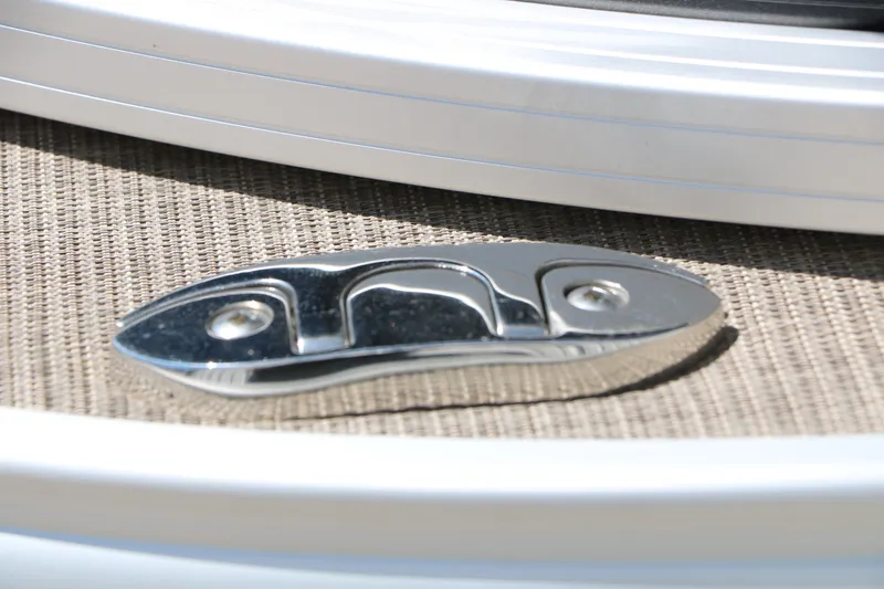Slide: The Image of Chrome cleat on 2025 Sun Tracker SportFish 20 DLX boat deck. - 44
