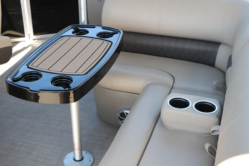Slide: The Image of Luxurious seating area with cup holders on the 2025 Sun Tracker SportFish 20 DLX boat. - 31