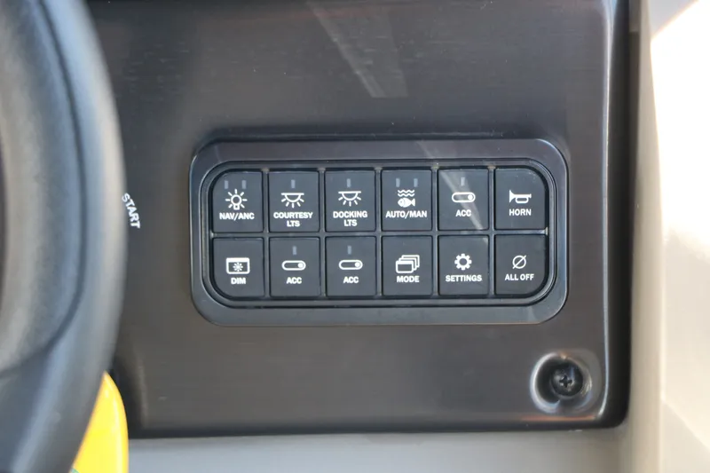 Slide: The Image of Control panel of 2025 Sun Tracker SportFish 20 DLX with various function buttons. - 33