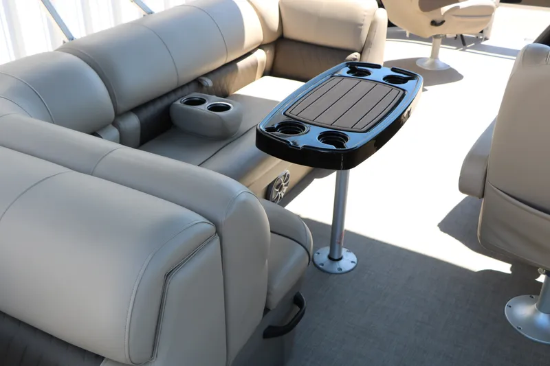 Slide: The Image of Luxurious seating area on 2025 Sun Tracker SportFish 20 DLX pontoon boat. - 19