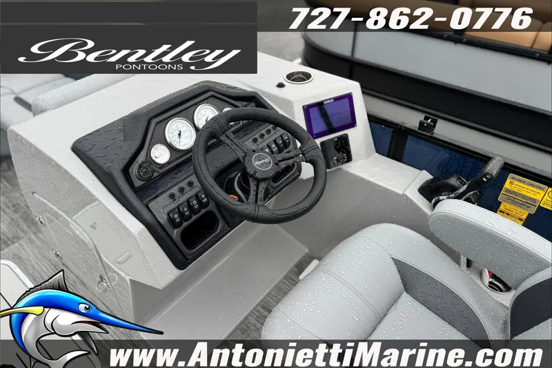 Slide: The Image of 2027 Bentley Pontoons Legacy 243 Swingback EXT dashboard with controls and steering wheel. - 4