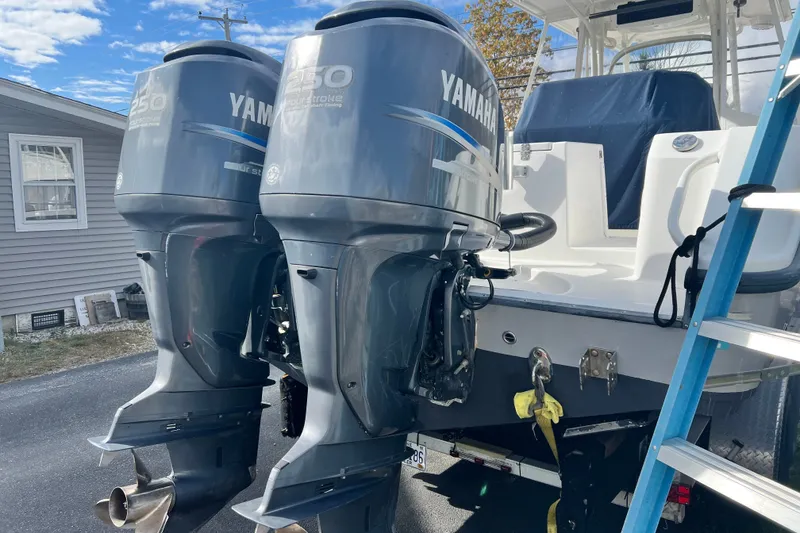 Slide: The Image of 2008 Edgewater 318CC boat with dual Yamaha 250 outboard engines. - 12