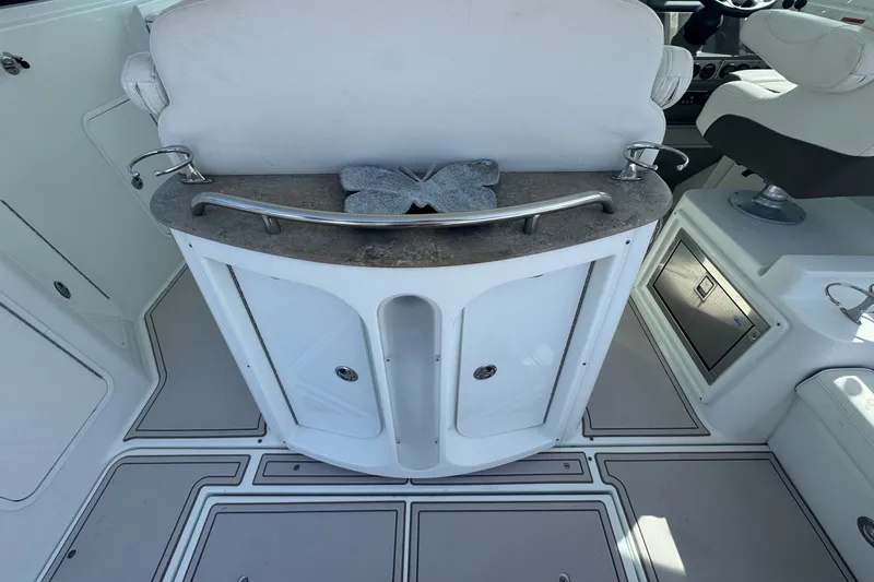 Slide: The Image of 2009 Cruisers Yachts 390 Sports Coupe interior with seating and storage area. - 12