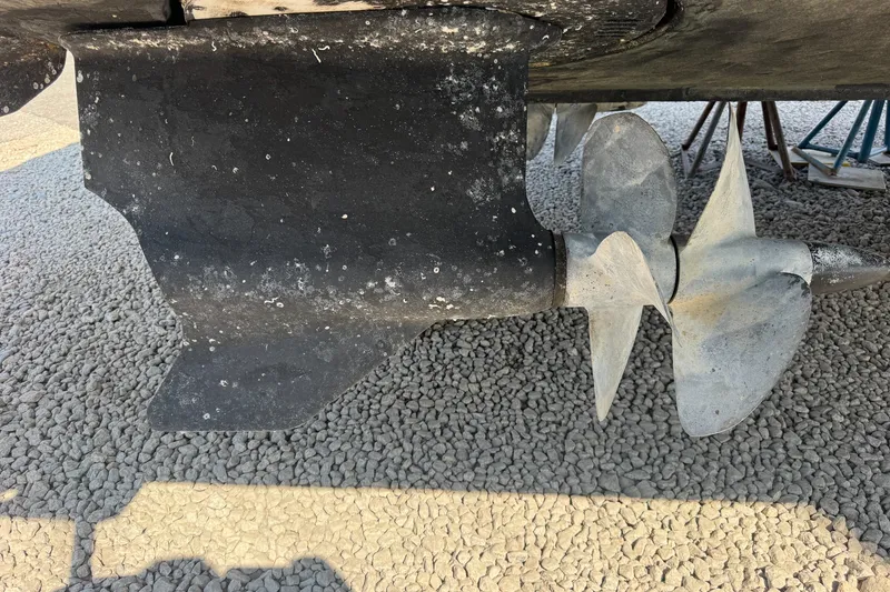Slide: The Image of Propeller and rudder of 2009 Cruisers Yachts 390 Sports Coupe on dry dock. - 26