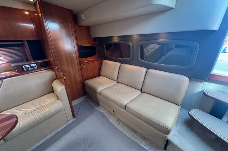 Slide: The Image of Luxurious interior of 2009 Cruisers Yachts 390 Sports Coupe with beige leather seating. - 18